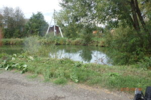 a pond on a land site