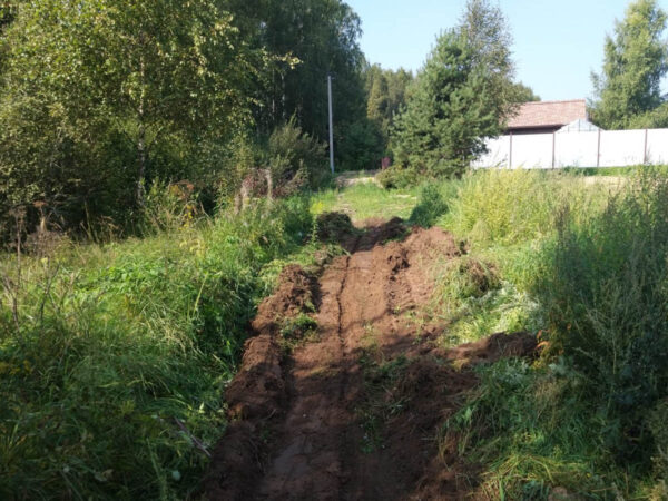 plowing a firebreak near the village