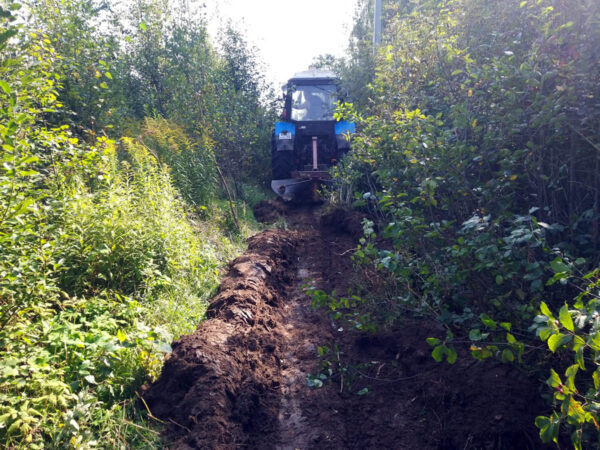 tractor working with a forestry plow