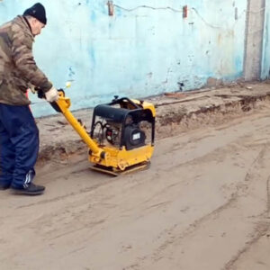 compacting layers of backfill soil