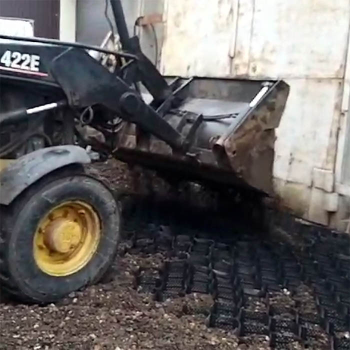 filling the geogrid with a mixture of gravel and sand