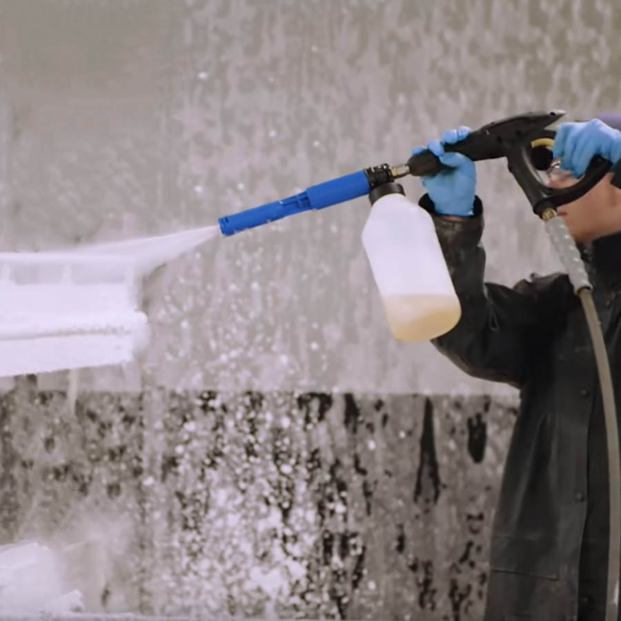 Washing the premises and equipment with a disinfectant solution