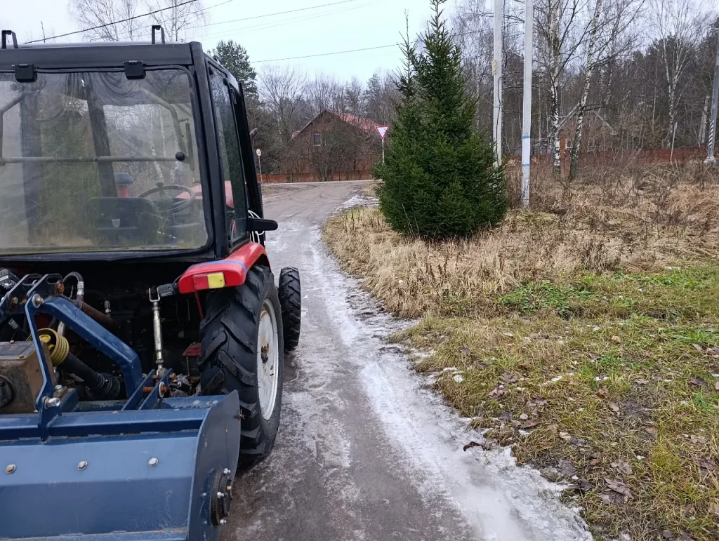 The tractor with a rod mulcher for ground fire protection