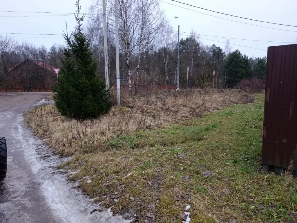 A mulcher with a tractor for clearing dry vegetation can be used on roadsides and under power lines